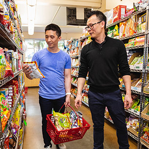 Person in grocery store smiling