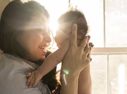 Mom holding baby