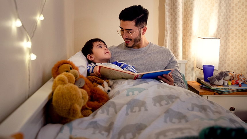 father reading to son