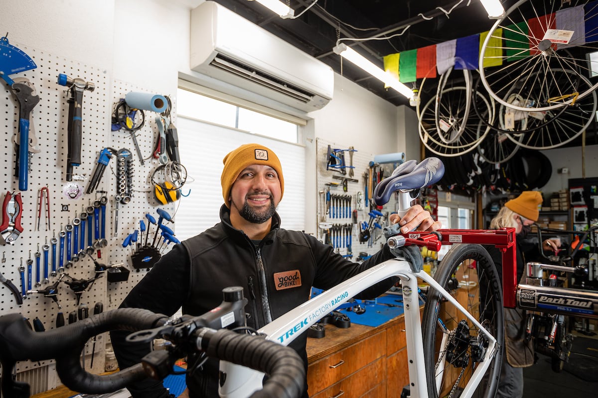 Bike mechanic in shop