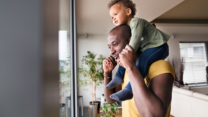 Man with son on shoulders