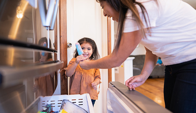 Mom and child with freezer