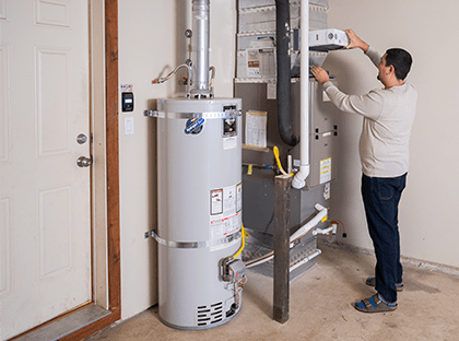 Man working on furnace